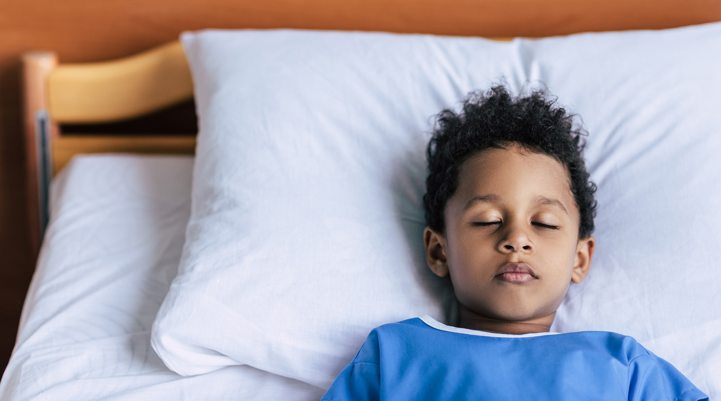 boy sleeping in bed