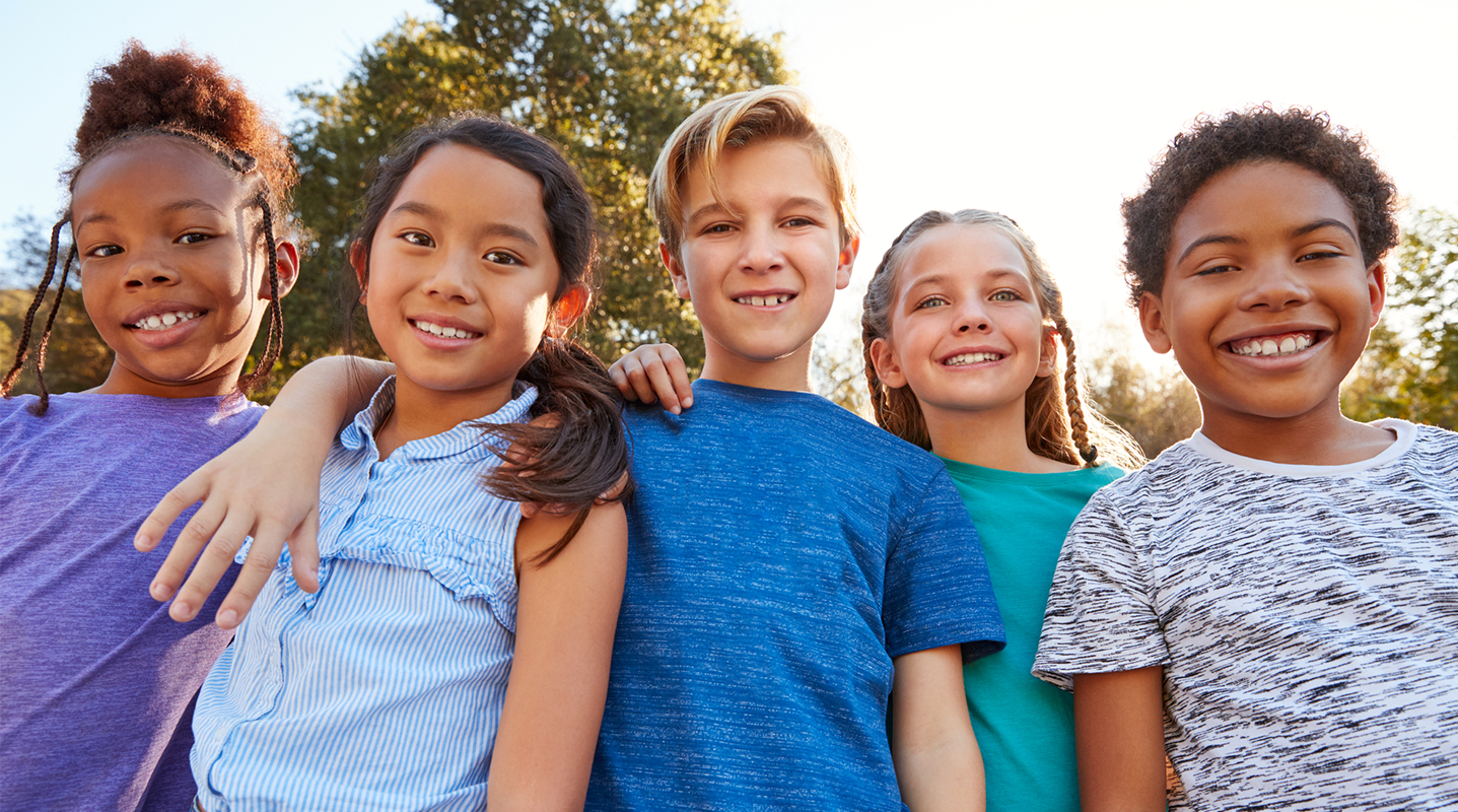 multiethnic tweens smiling